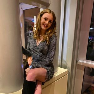 Black dress with silver sparkle, adjustable cinch on left leg